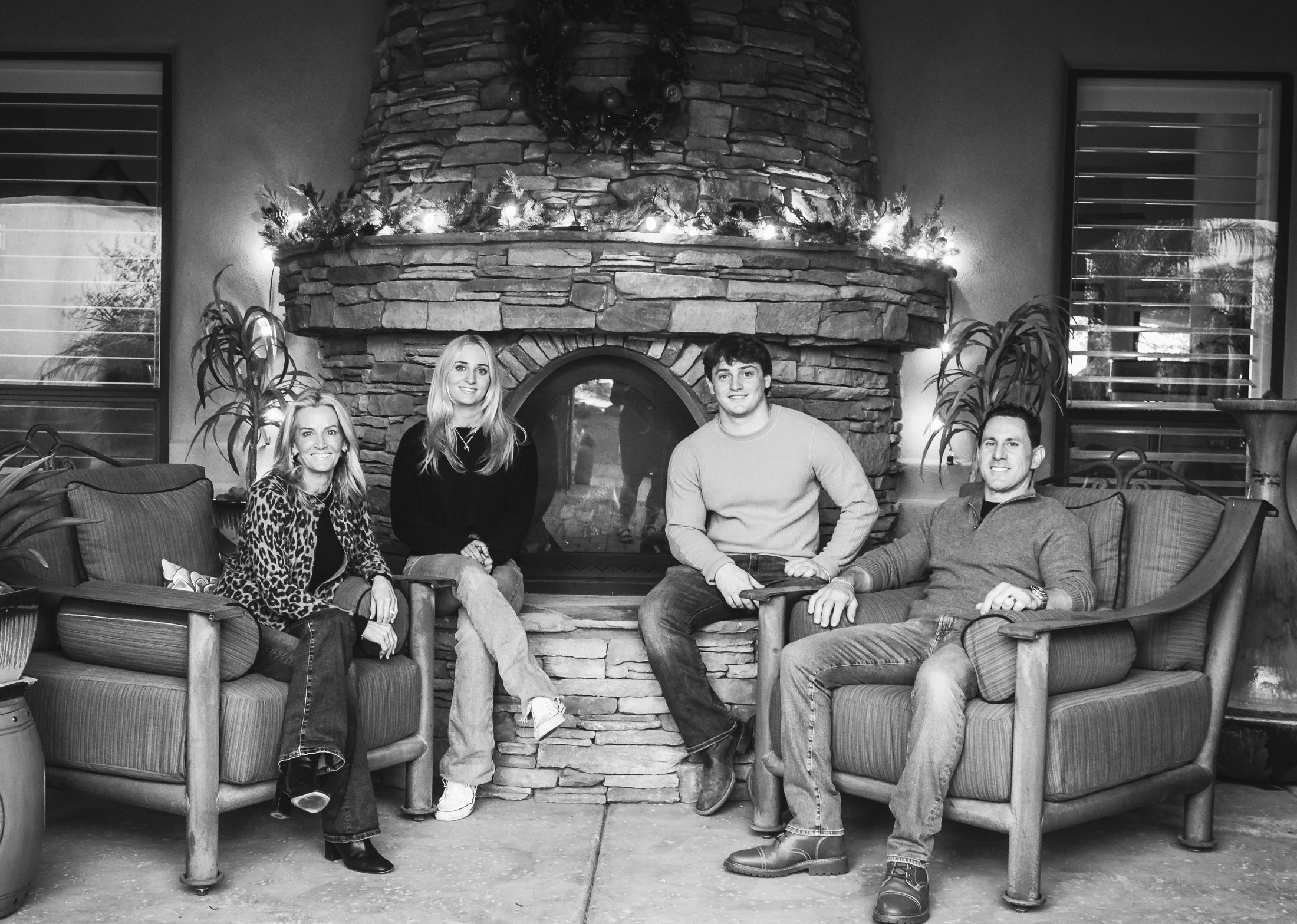 The Bush family by their stone fireplace